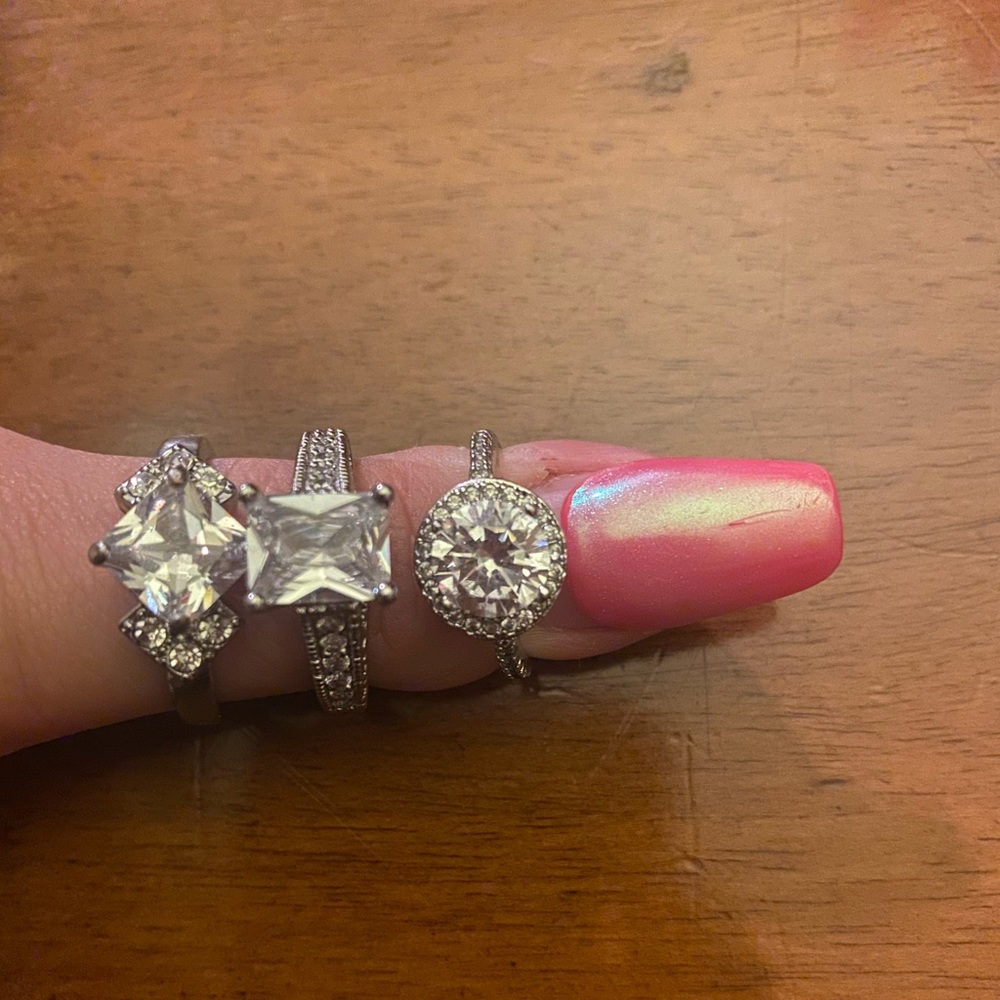 3 silver off-diamond rings